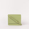 Front view of Audrey Mini in Tea Green with crossbody strap