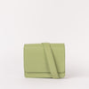 Front view of Audrey Mini in Tea Green with shoulder strap