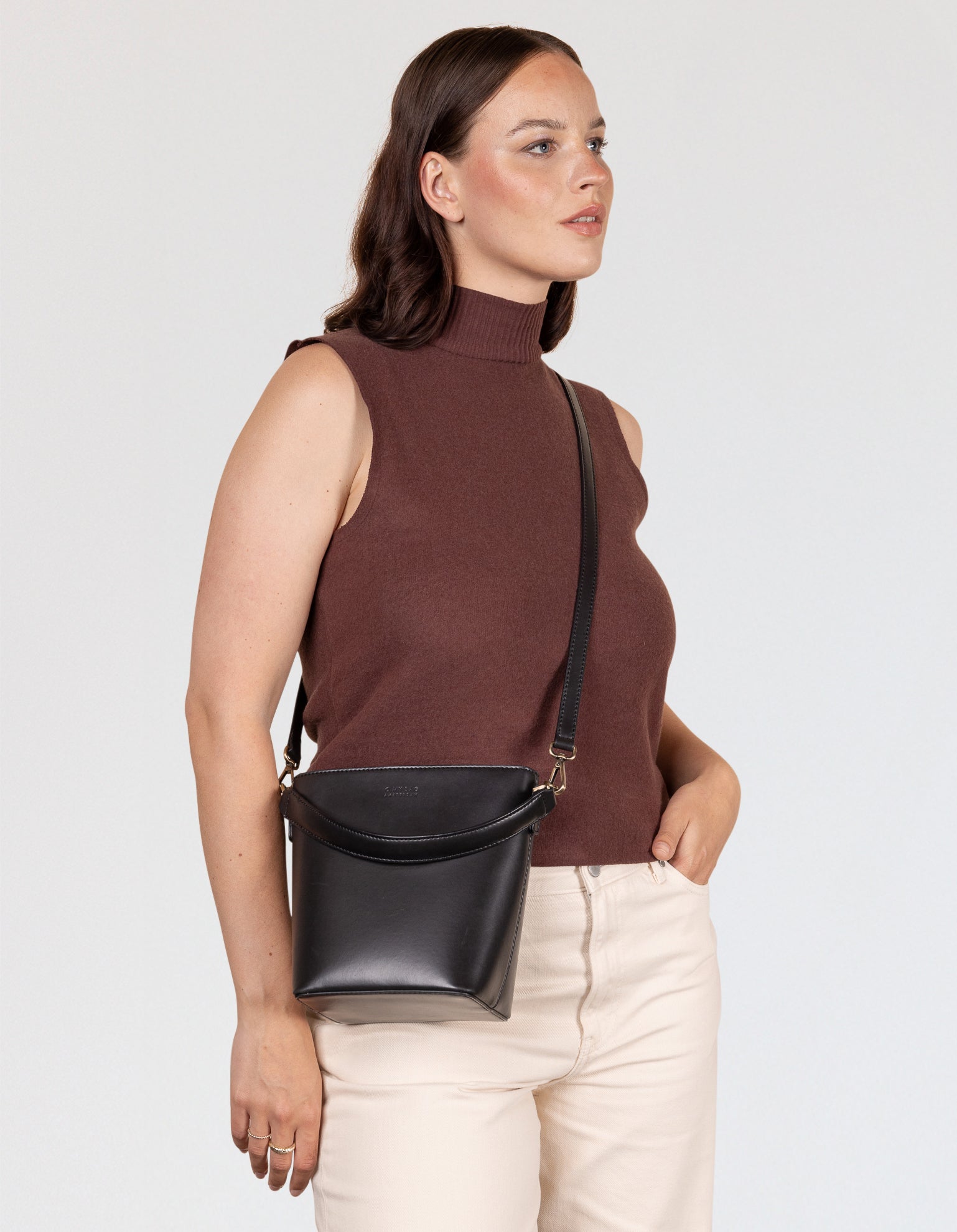Female model wearing bag cross-body