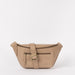 Front view of Drew Bumbag in Sand coloured leather with the leather strap