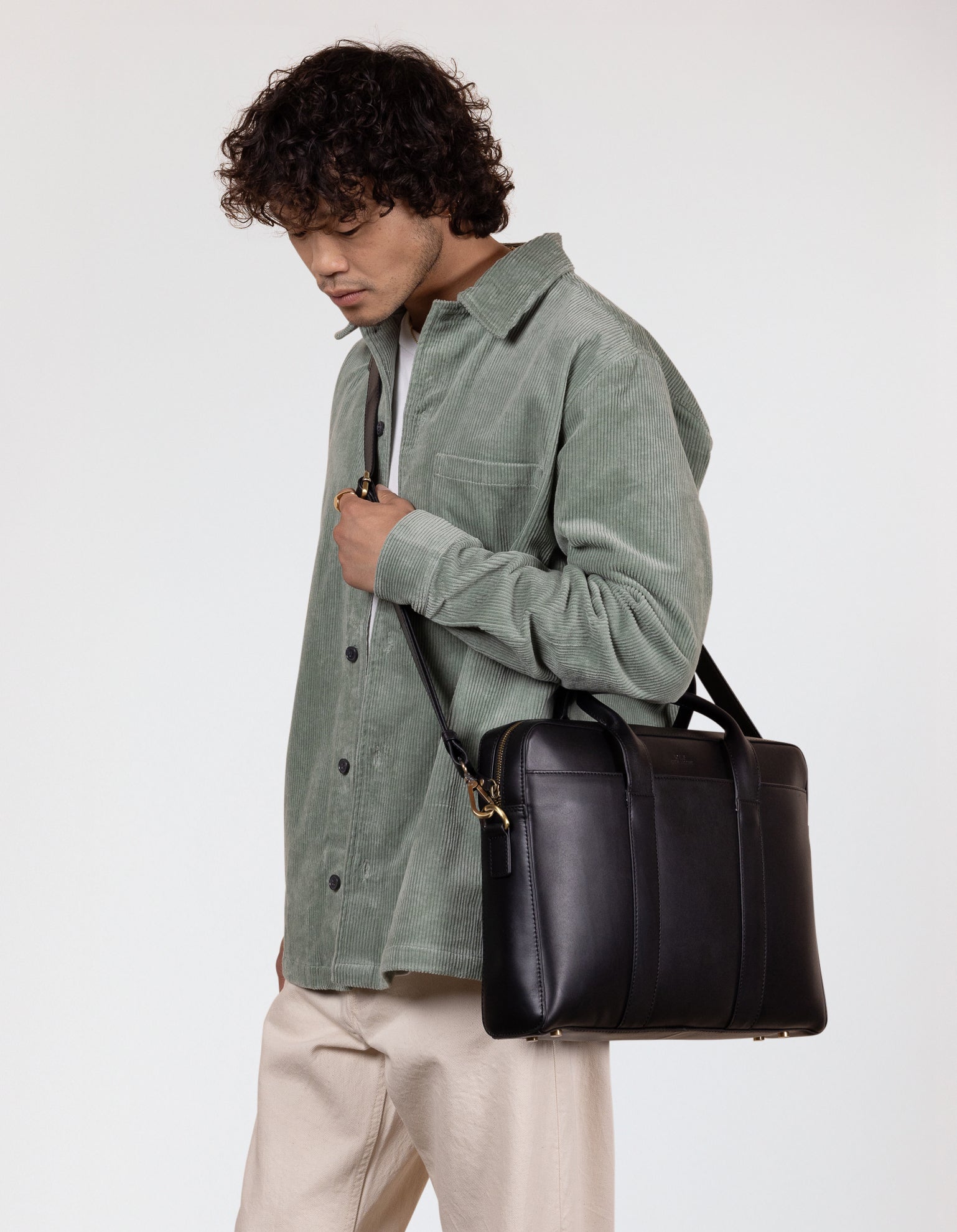 Black Leather business bag. Model product image.