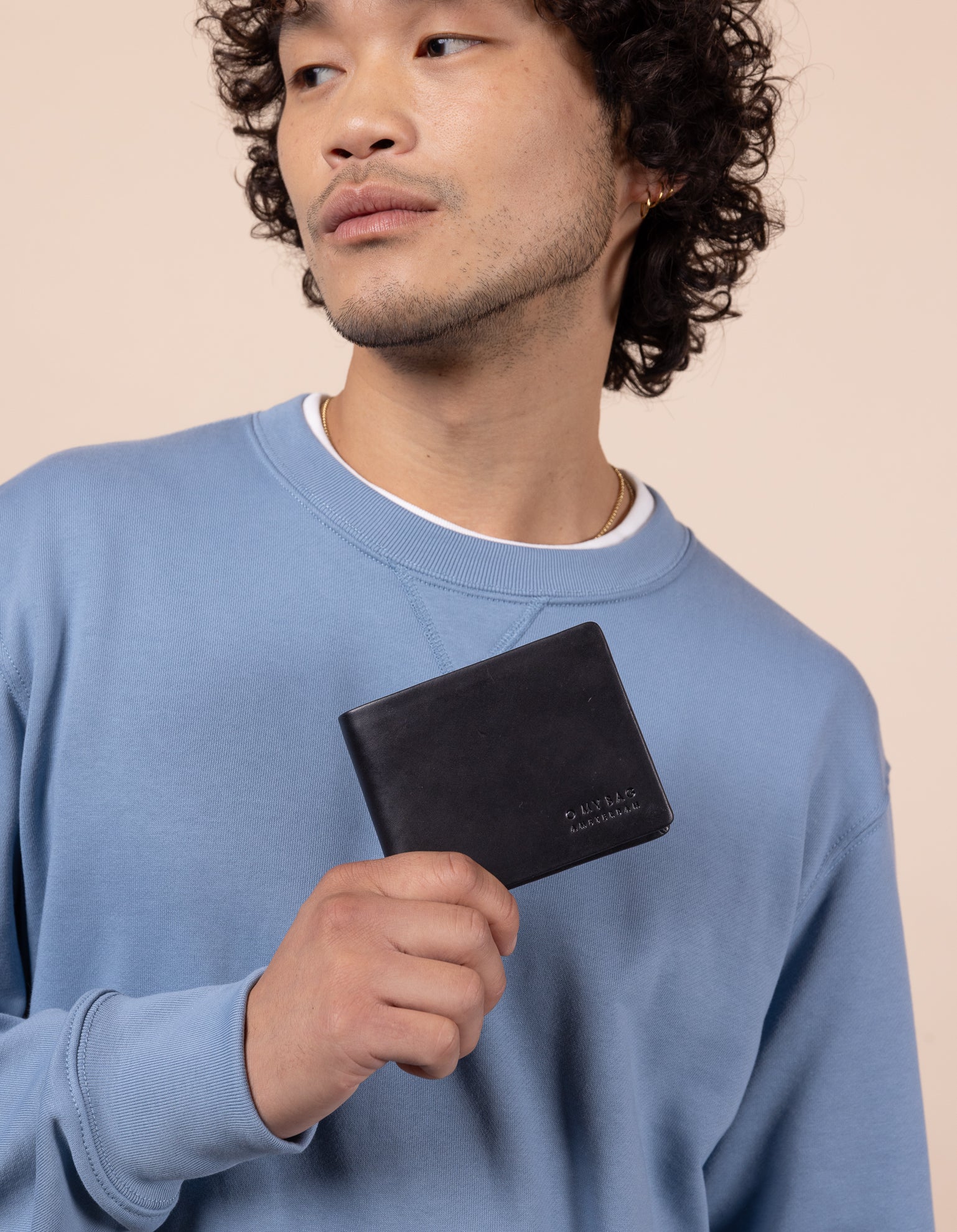 Male model with Joshua leather wallet