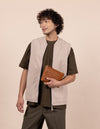 Male model with Lexi bag in cognac woven classic leather bag