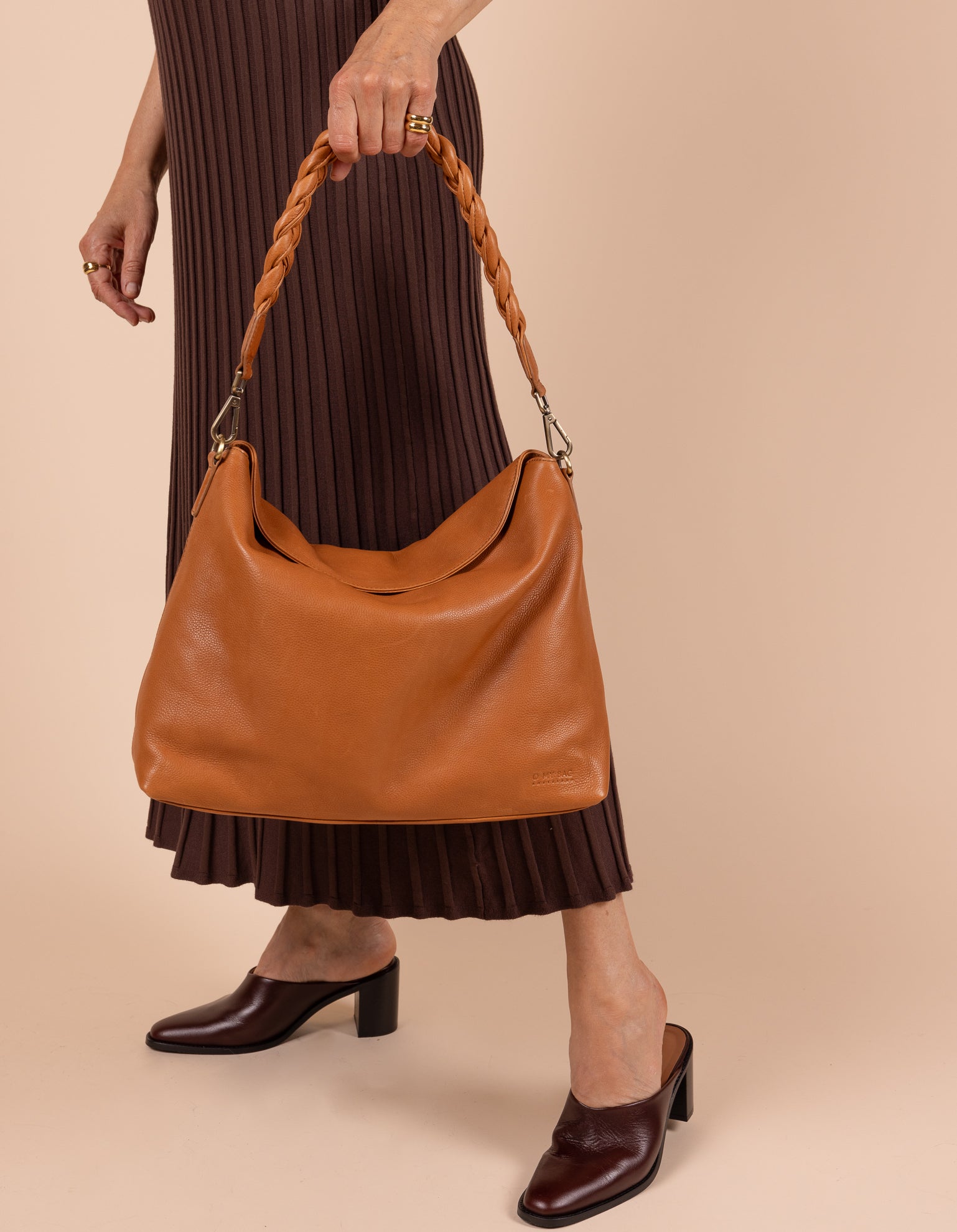 Model image showcasing Sienna wild oak soft grain leather crossbody work bag with braided shoulder strap