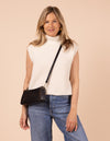 Model image of Taylor black classic leather mini shoulder bag with adjustable leather strap