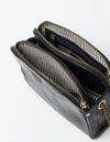 Black Leather womens handbag. Square shape with an adjustable leather & chain strap. Inside product image.