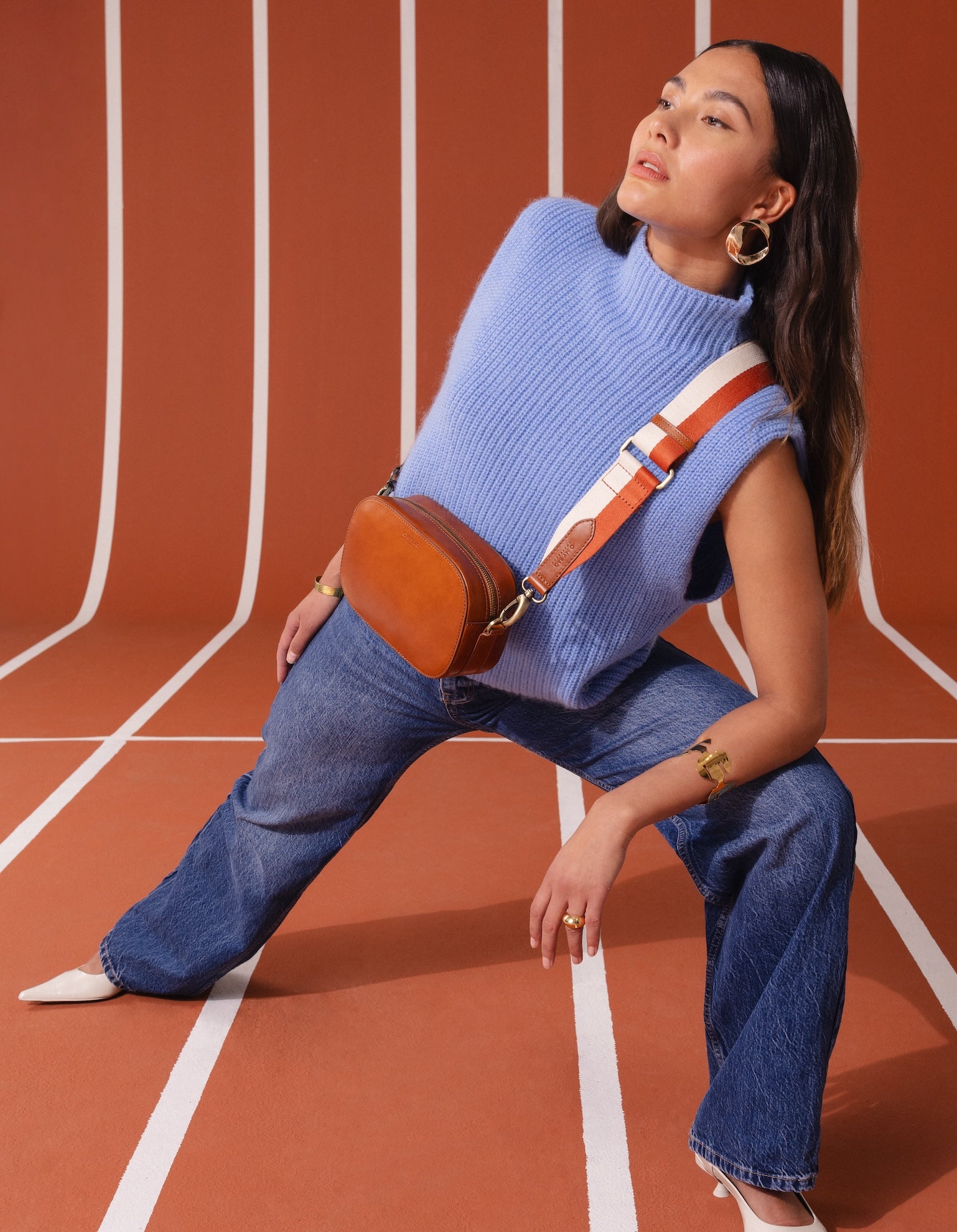 Campaign image of Maya cognac classic leather crossbody bag