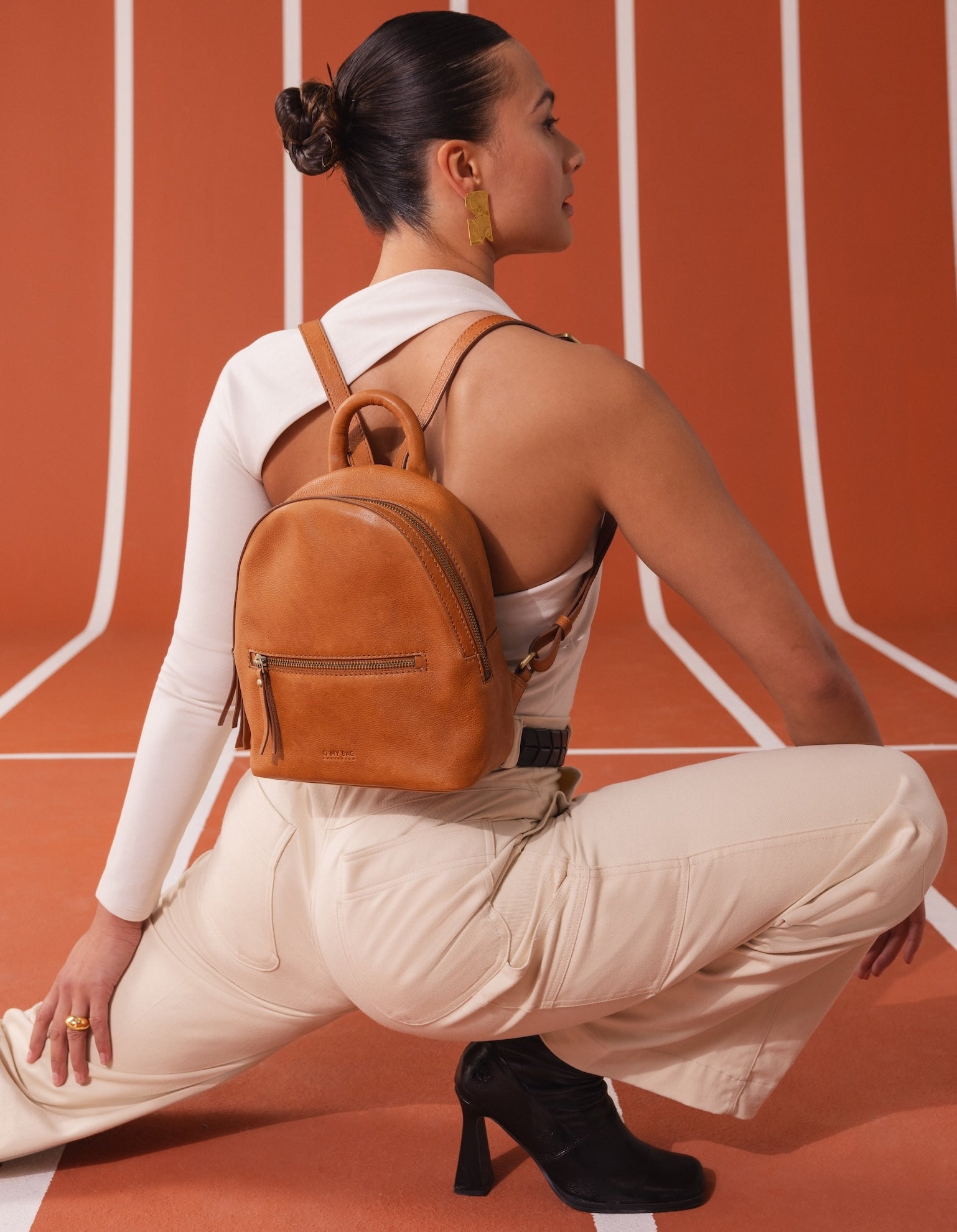 Campaign image of Ivy wild oak soft grain leather backpack