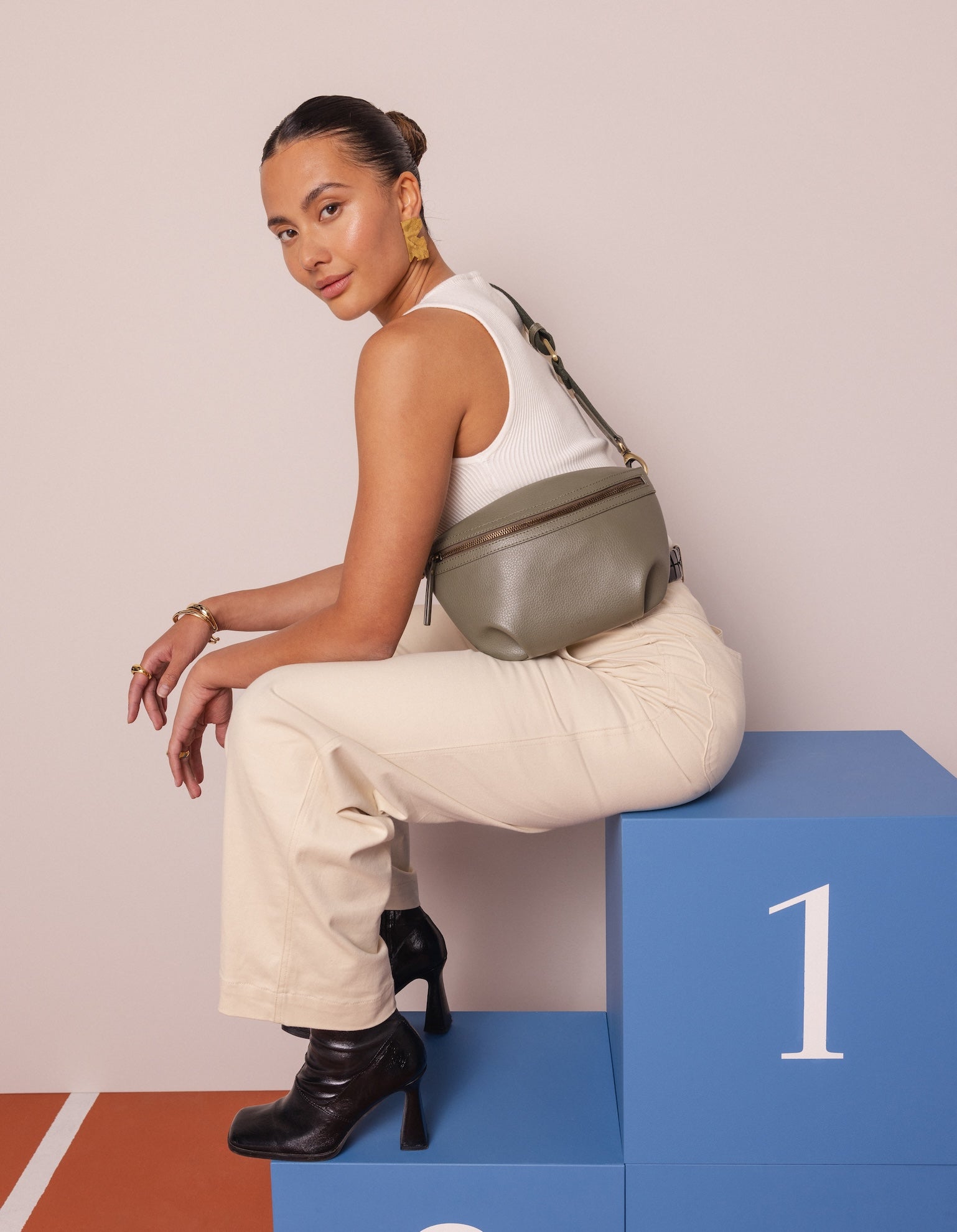 Campaign image of Milo sage Mirum bum bag