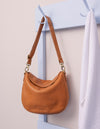 Campaign image of Lana wild oak soft grain leather crossbody bag