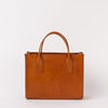 Front view of Jackie Midi in Cognac-coloured leather