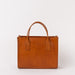 Front view of Jackie Midi in Cognac-coloured leather
