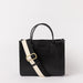 Front view of Jackie Midi in balck leather with strap