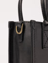 Rectangle shaped mini leather bag - close-up of side details.