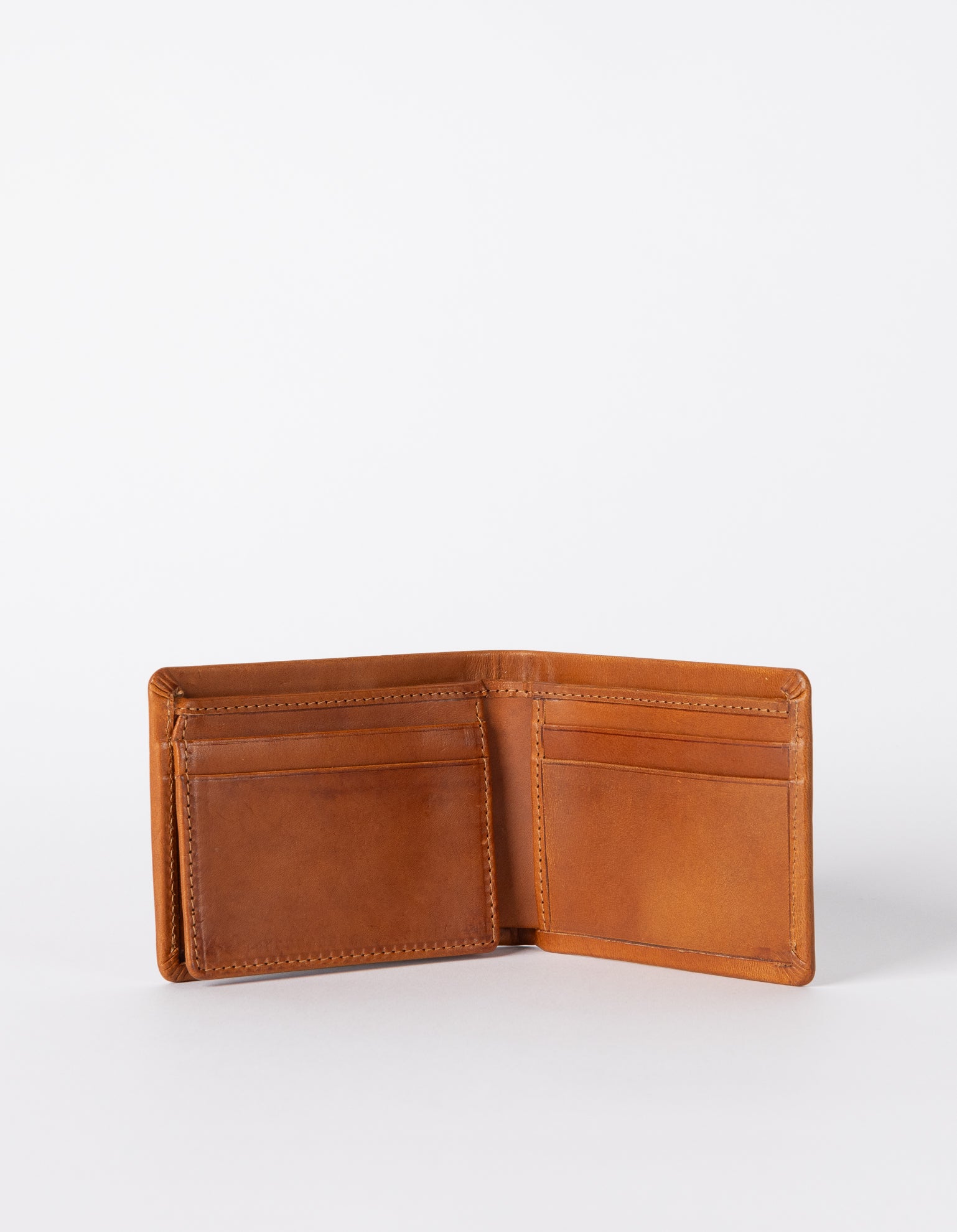 Cognac Leather fold over wallet. Square shape. Inside product image.