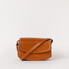Front view of Kendalini in Cognac-coloured leather with strap