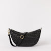 Front view of Leo in woven black leather with a strap