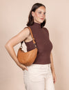 Model wearing the wild oak Leo bag on her shoulder