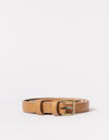 Cognac brown rolled up bag strap with buckle on white background