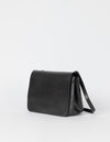Lucy in black classic leather. Crossbody handbag. Side product image.