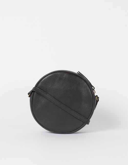 Luna Bag Black Soft Grain Leather. Circular crossbody bag for women. Back product image.