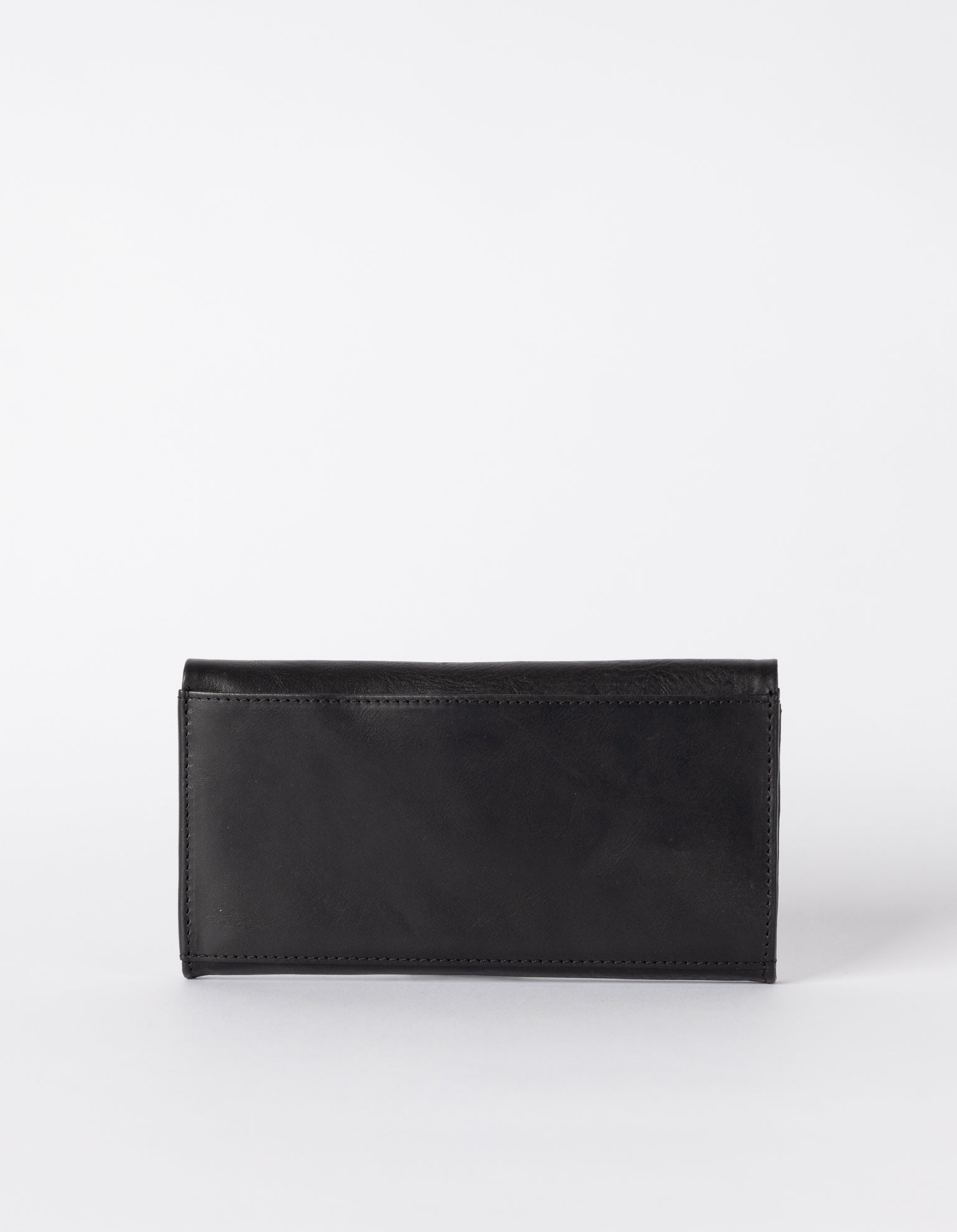 Pau Pouch Black Leather women’s purse. Rectangular shaped fold over wallet. Back model image.