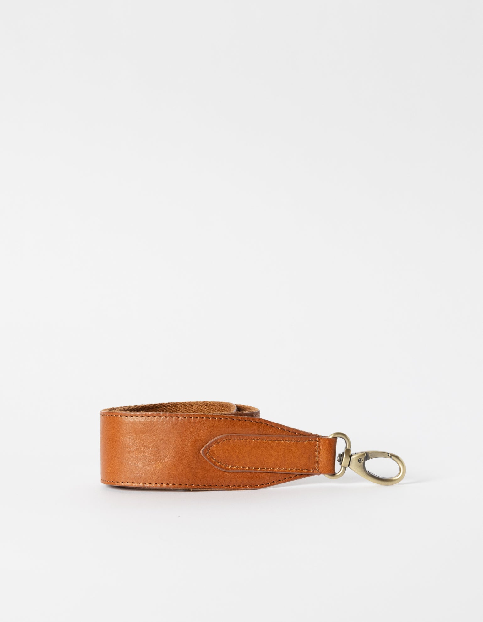 Cognac stromboli leather add-on handbag strap with webbing on one side. product image.