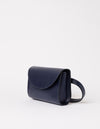 Navy vegan leather belt bag on a white background - ecom product image with strap on the side