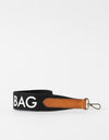 Black canvas cotton handbag strap with cognac leather details and logo print. product image
