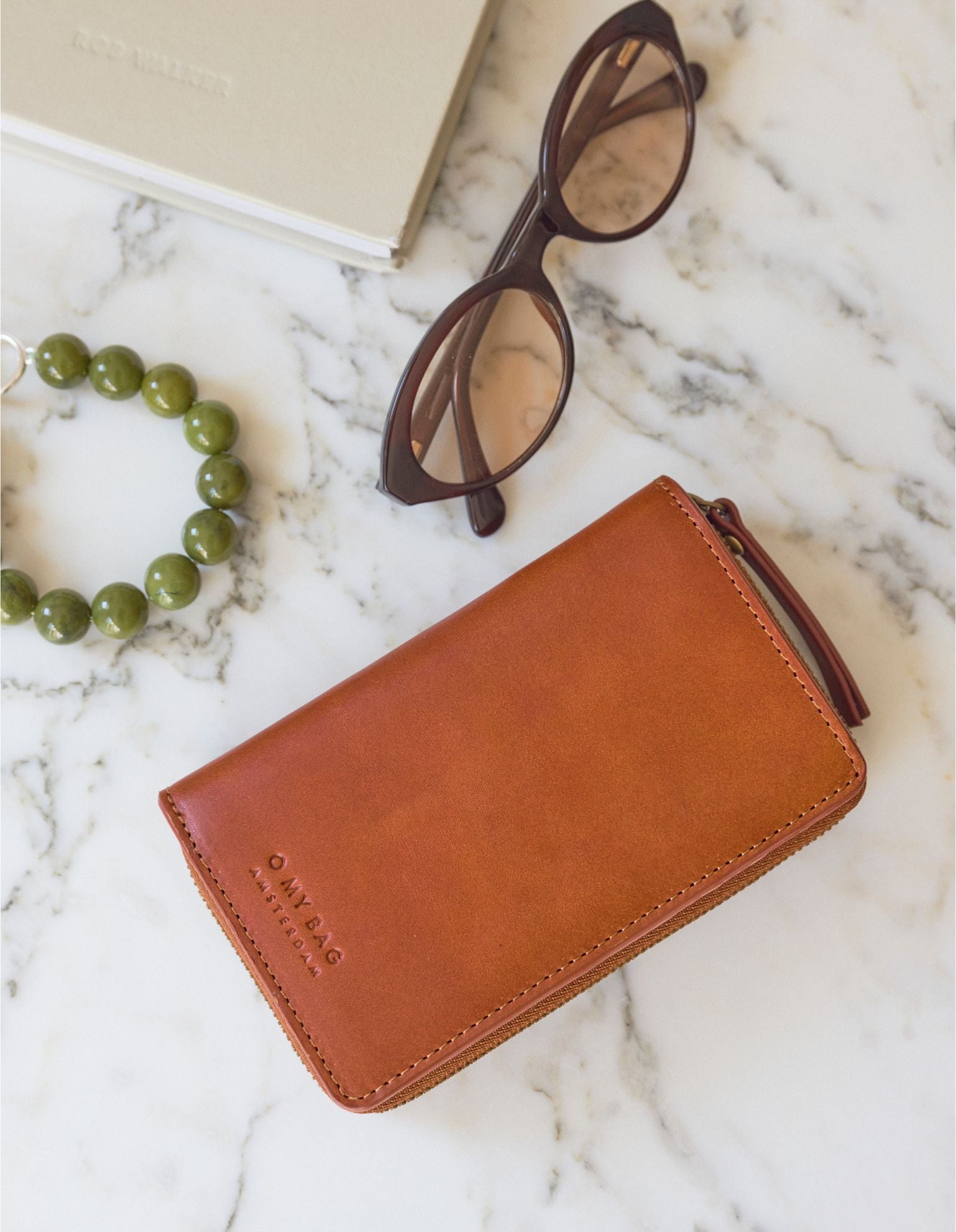Jett Wallet - Cognac Leather. Lifestyle Product Image.