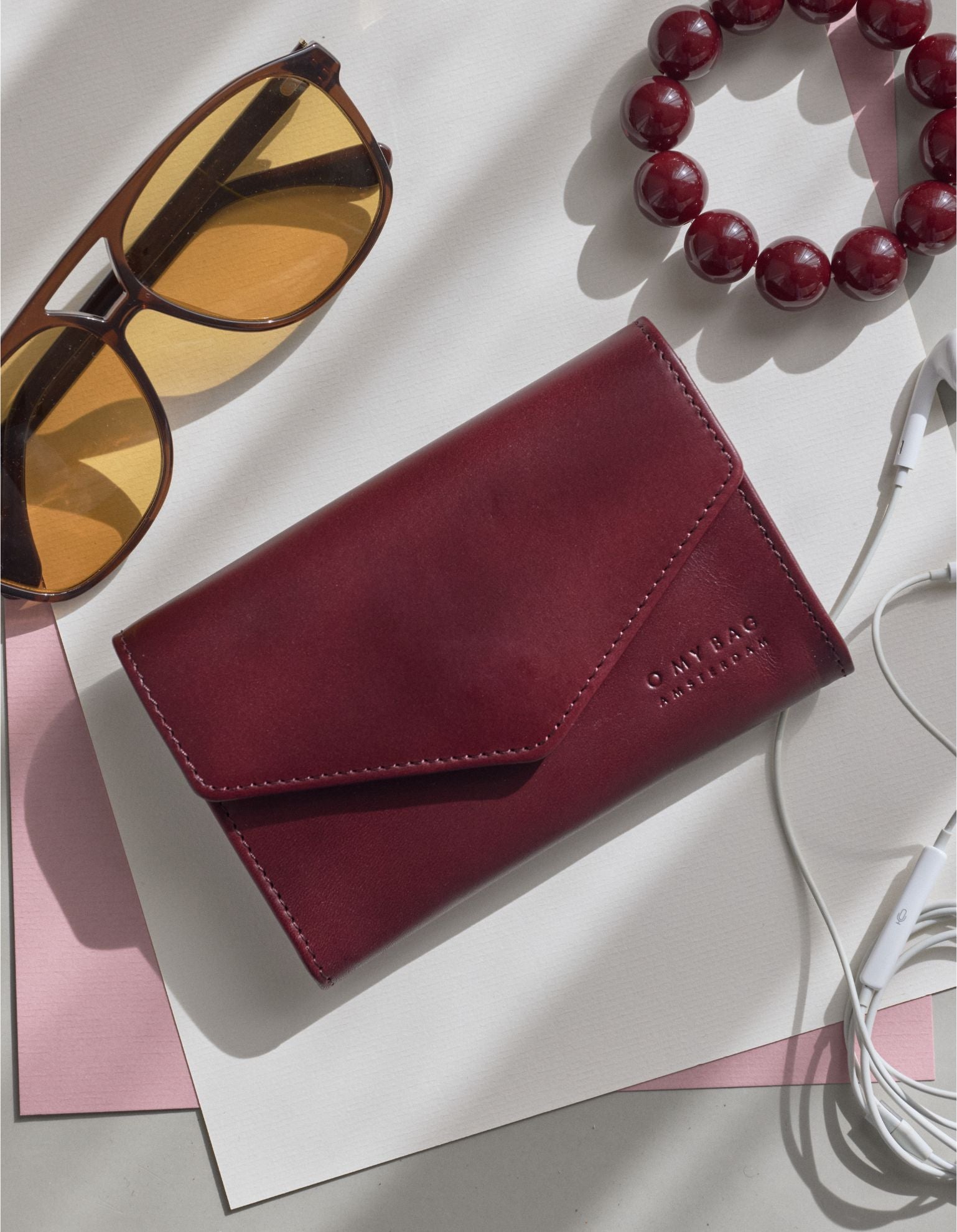 Jo's Purse - Cherry Classic Leather. Lifestyle product image.