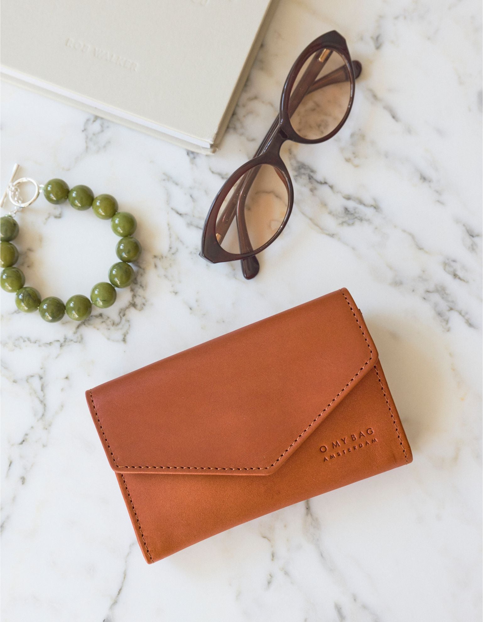 Jo's Purse - Cognac Classic Leather. Lifestyle product image.