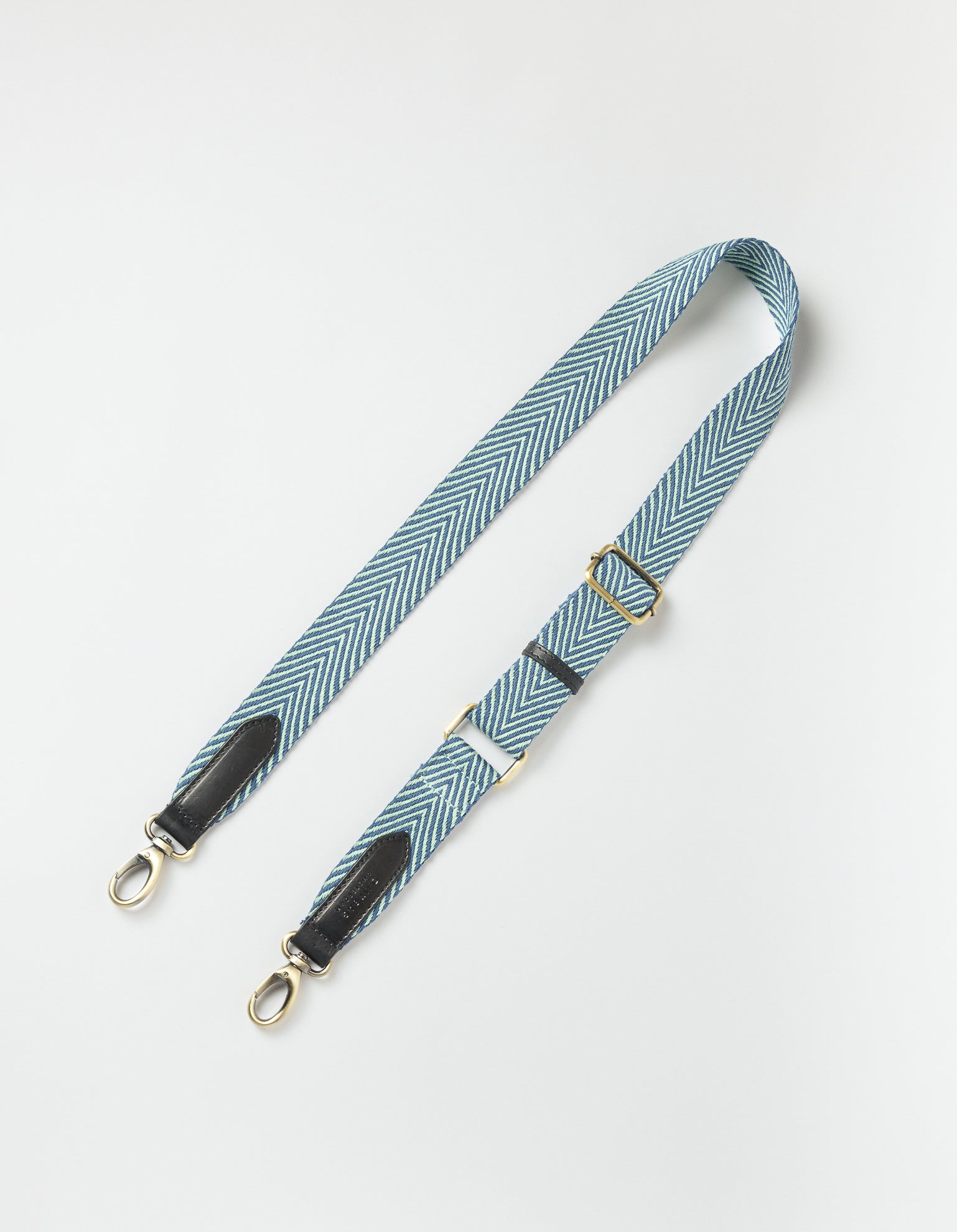Recycled and organic cotton jade webbing strap with black leather