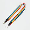 Rainbow webbing strap with black classic leather details.