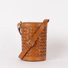 Zola woven leather bucket bag - front product image with strap