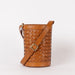 Zola woven leather bucket bag - front product image with strap