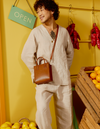 Campaign image of jackie mini tote bag with fresh fruit