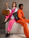 Campaign image Woven Kenzie bag with two models