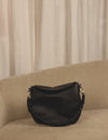 Inside bag video of Lana black soft grain leather crossbody bag with braided shoulder strap