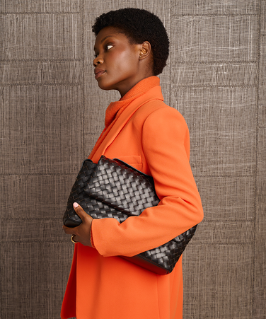 Model with Kenzie bag in woven leather