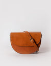 Ava saddle bag with a leather crossbody strap. Front product image - cognac classic leather.