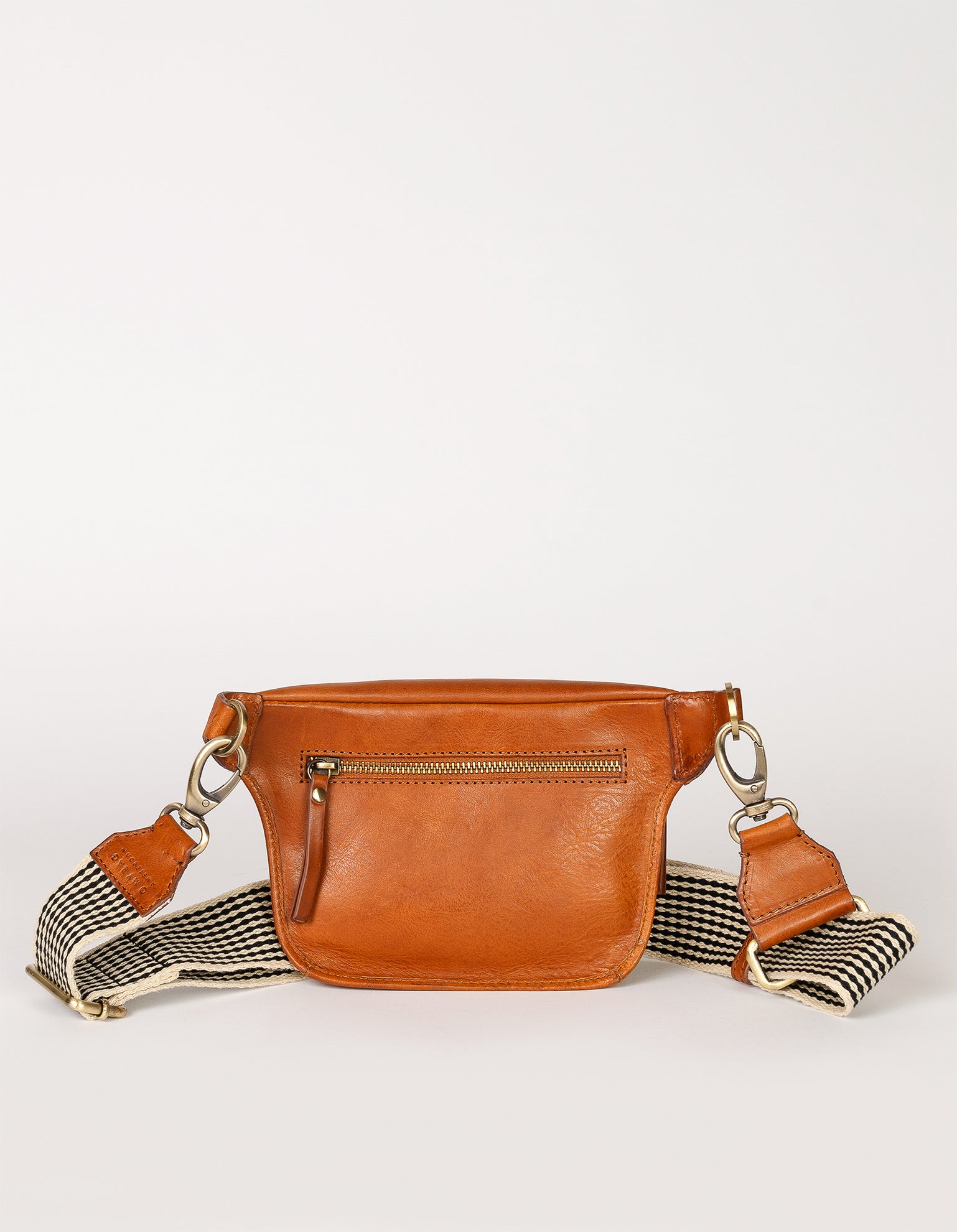 Cognac Leather womens fanny pack. Square shape with an adjustable strap. Back product image