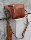 Wild Oak Croco Leather womens fanny pack. Square shape with an adjustable strap. Lifestyle product image