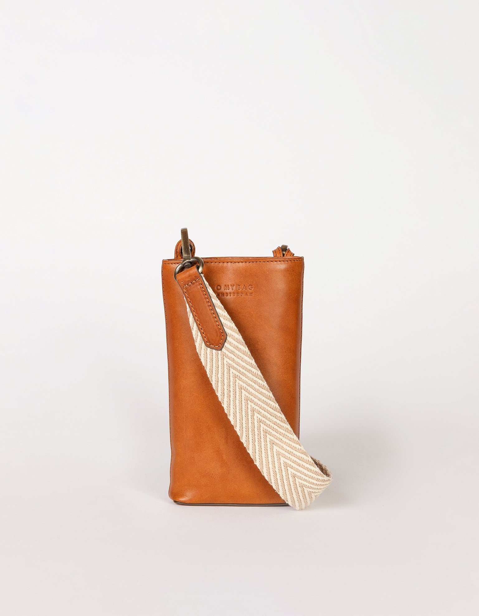 Charlie phone bag - cognac classic leather - product image with webbing strap