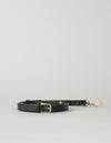 Black leather crossbody strap, rolled