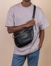 Drew Maxi Bum Bag in Black Soft Grain Leather - Model Image, adjustable leather strap