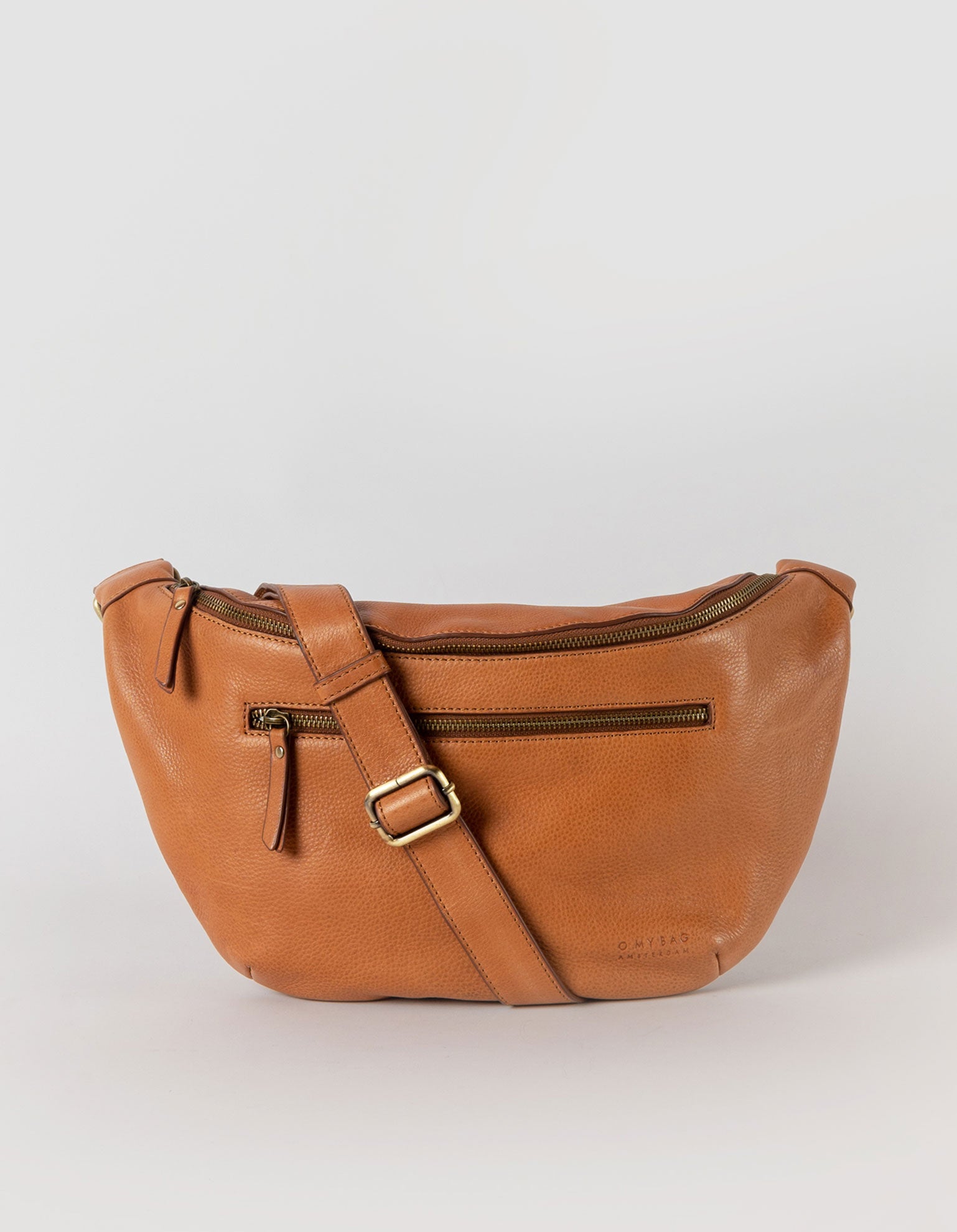 Drew Maxi in wild oak soft grain leather with adjustable leather strap. Front product image.