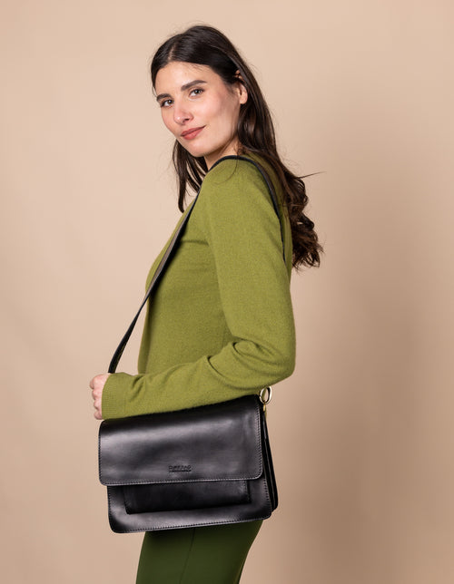 Harper Black Leather crossbody handbag. Model image