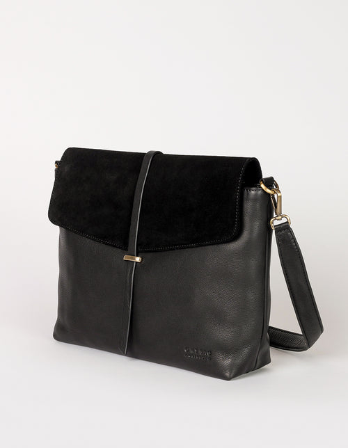 Black Soft Grain & Suede leather womens handbag. Square shape with an adjustable strap. Side product image.