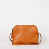 Cognac Leather womens handbag. Square shape with an adjustable strap. Front product image.